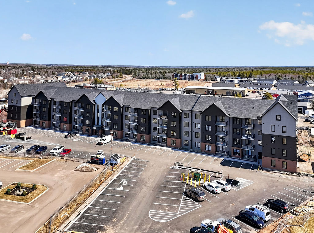 Modern apartment building at Quinn Court in Riverview with thoughtfully designed rental suites and community amenities.